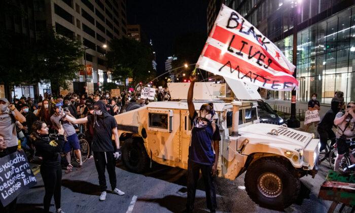 Iowa City Settles for $100,000 Over Arrest of Photographer in 2020 Protest
